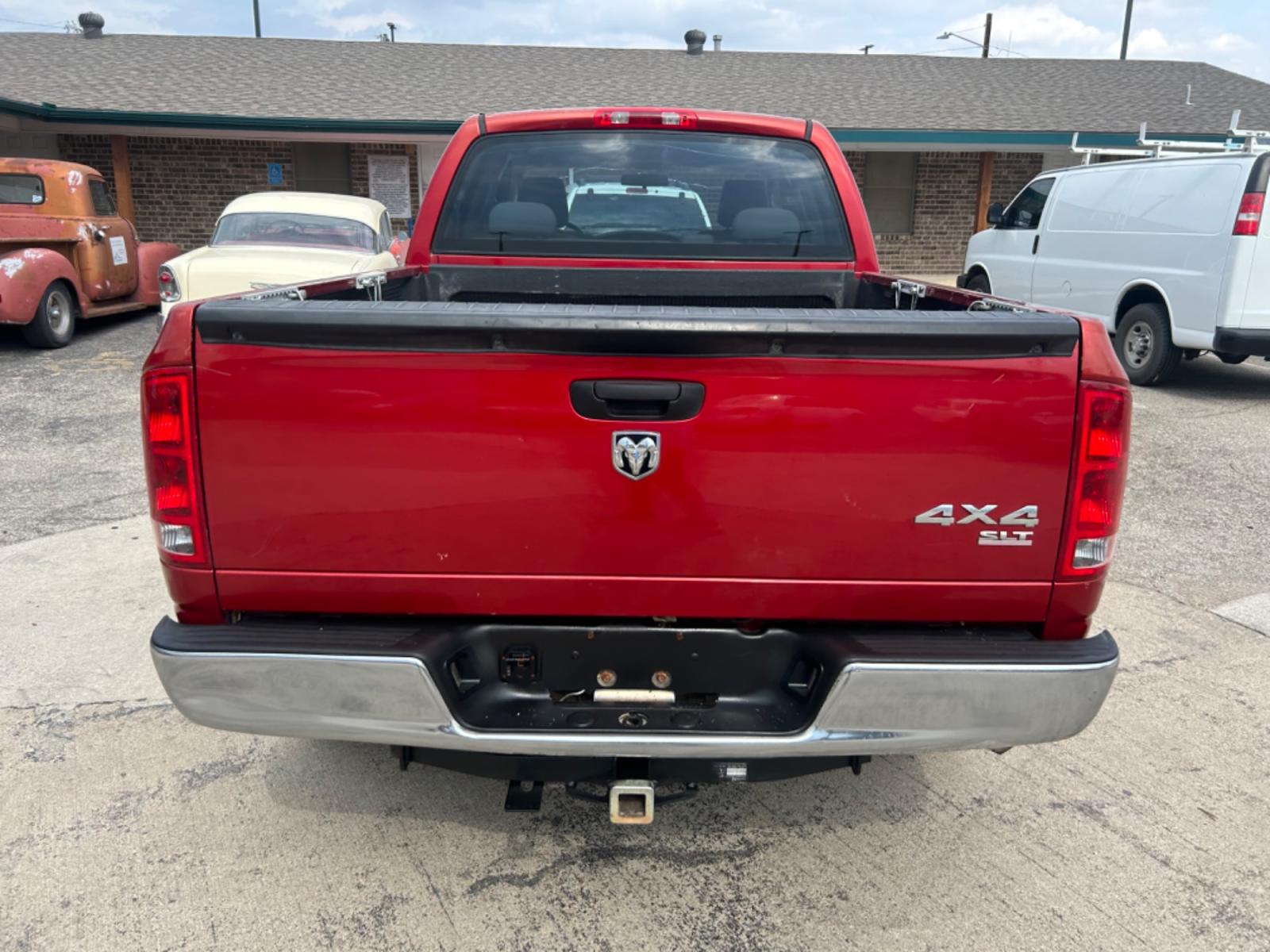 2006 Red /Beige Dodge Ram 1500 (1D7HU18N36S) , located at 1687 Business 35 S, New Braunfels, TX, 78130, (830) 625-7159, 29.655487, -98.051491 - Photo #2